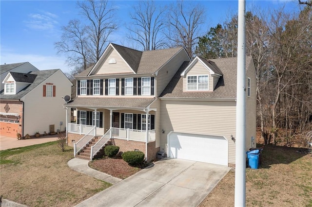 view of front of house featuring concrete driveway, stairs, a front yard, roof with shingles, and covered porch