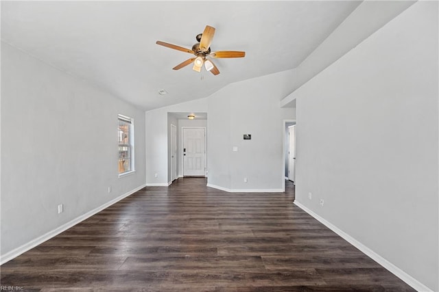 unfurnished living room featuring dark wood finished floors, ceiling fan, lofted ceiling, and baseboards