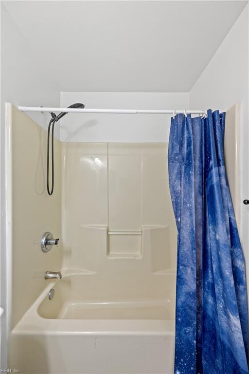 full bath with shower / bath combination with curtain