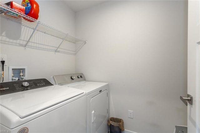 washroom with laundry area and washing machine and clothes dryer