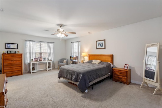 bedroom with baseboards, carpet, and ceiling fan