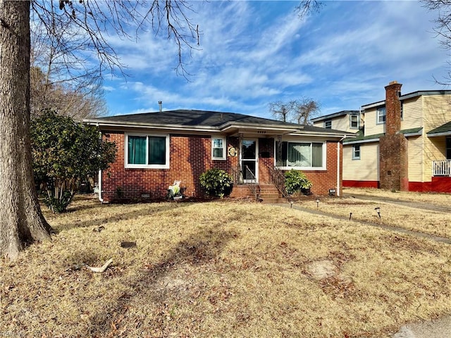 ranch-style house with crawl space and brick siding