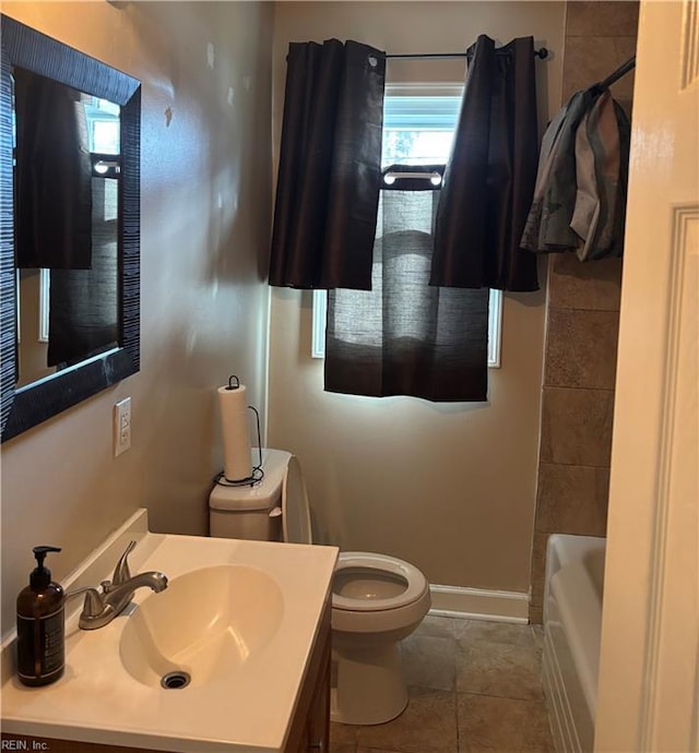 bathroom featuring tile patterned floors, toilet, a washtub, walk in shower, and vanity