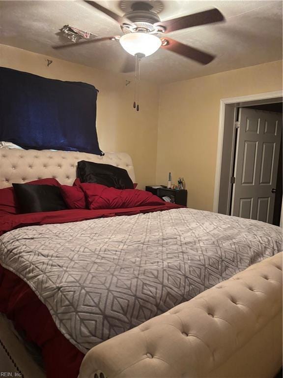 bedroom featuring a ceiling fan