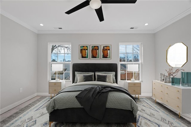 bedroom featuring visible vents, baseboards, and ornamental molding