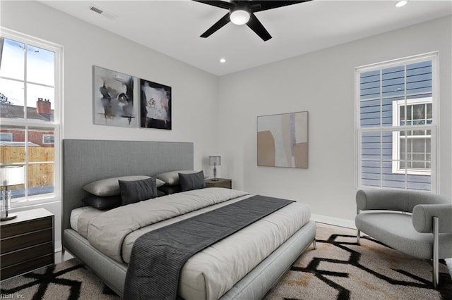 bedroom with visible vents, recessed lighting, a ceiling fan, and baseboards