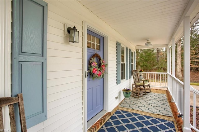 entrance to property featuring covered porch