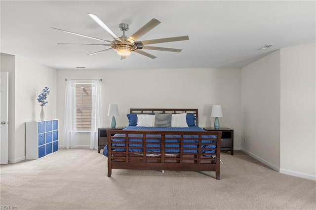 bedroom with visible vents, baseboards, and carpet