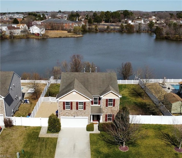 bird's eye view with a water view