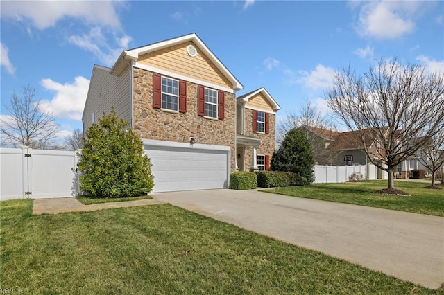 traditional home with a front yard, a gate, fence, concrete driveway, and stone siding