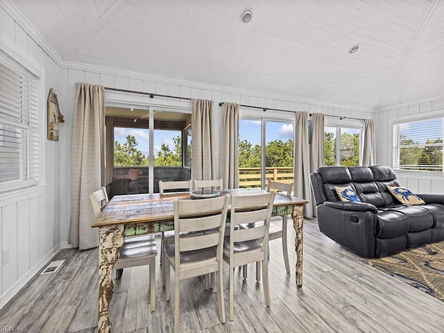 sunroom with visible vents, wooden ceiling, and vaulted ceiling