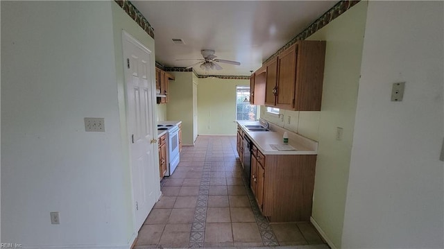 kitchen featuring visible vents, brown cabinets, a ceiling fan, electric stove, and light countertops