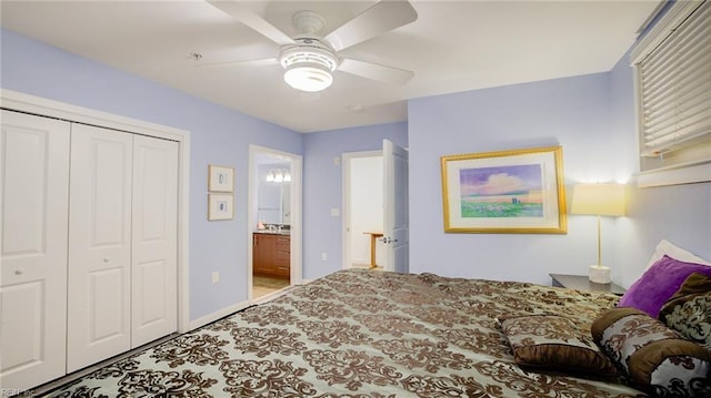 bedroom featuring a closet, baseboards, ceiling fan, and ensuite bathroom