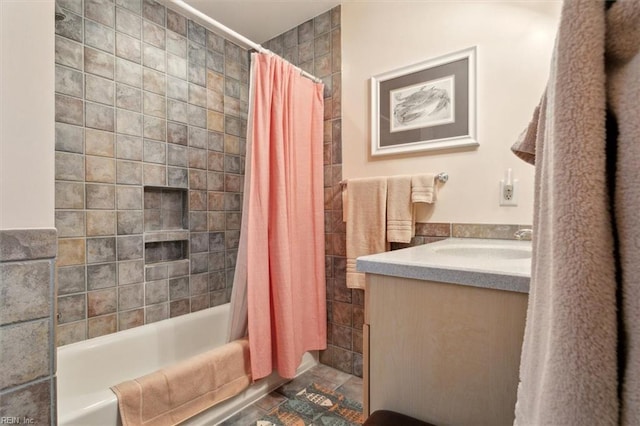 bathroom featuring shower / bathtub combination with curtain and vanity