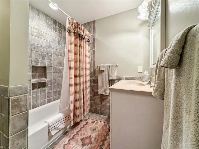 full bathroom with tile patterned floors, vanity, and shower / bath combination with curtain