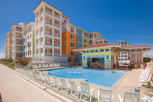 community pool with a patio