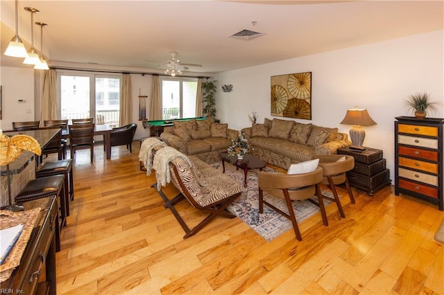 living area featuring visible vents, pool table, light wood-type flooring, and a ceiling fan