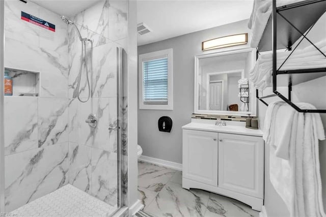 full bathroom with toilet, marble finish floor, a marble finish shower, baseboards, and vanity