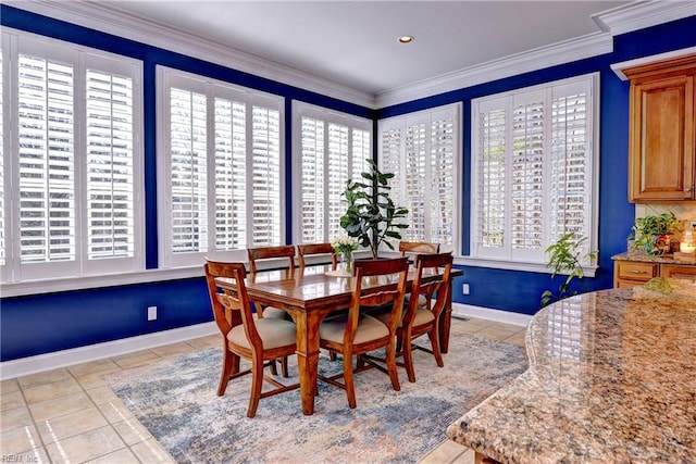 dining room with light tile patterned floors, baseboards, recessed lighting, and crown molding