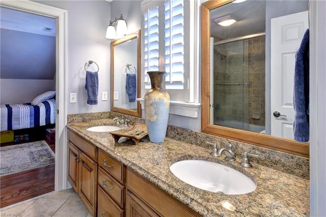 ensuite bathroom with a sink, an enclosed shower, and ensuite bath