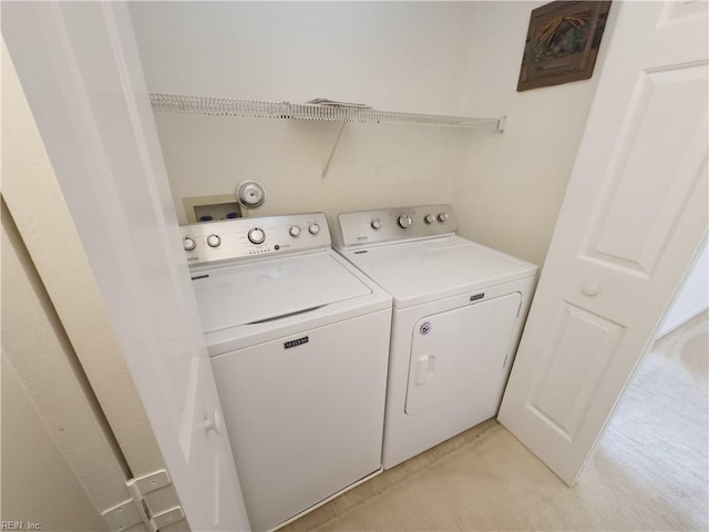 laundry room featuring laundry area and independent washer and dryer