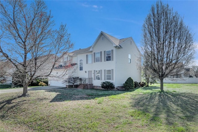 view of property exterior featuring a lawn