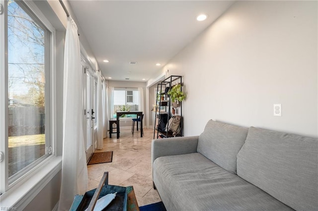 living room with recessed lighting