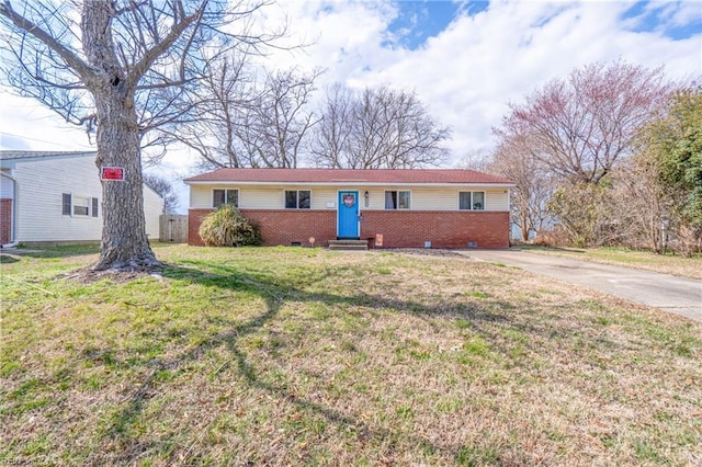 single story home with crawl space, concrete driveway, brick siding, and a front lawn