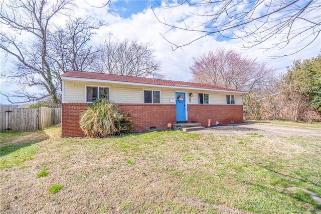 ranch-style house with crawl space, a front yard, brick siding, and fence