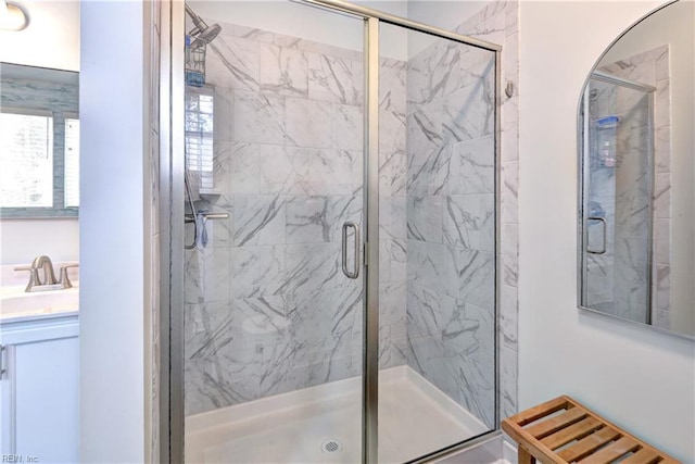 full bathroom featuring a shower stall and vanity