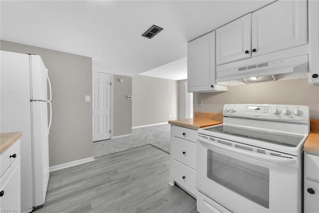 kitchen featuring visible vents, under cabinet range hood, light countertops, white cabinets, and white appliances