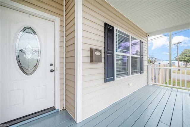 entrance to property with a porch