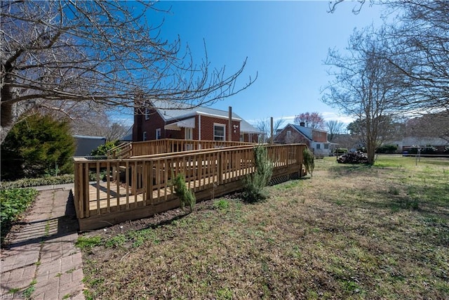 view of yard with a wooden deck