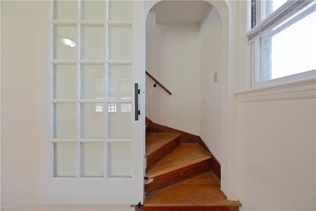 stairs featuring arched walkways