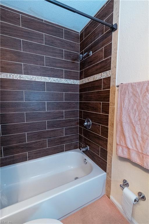 bathroom featuring tub / shower combination