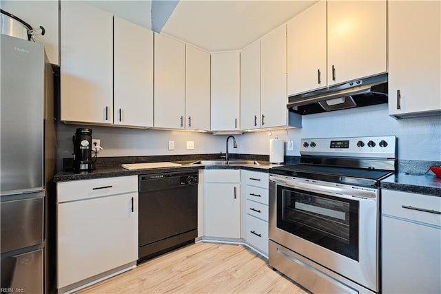 kitchen featuring under cabinet range hood, light wood-type flooring, stainless steel appliances, white cabinetry, and a sink