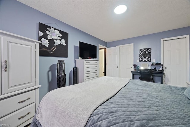 bedroom with a textured ceiling