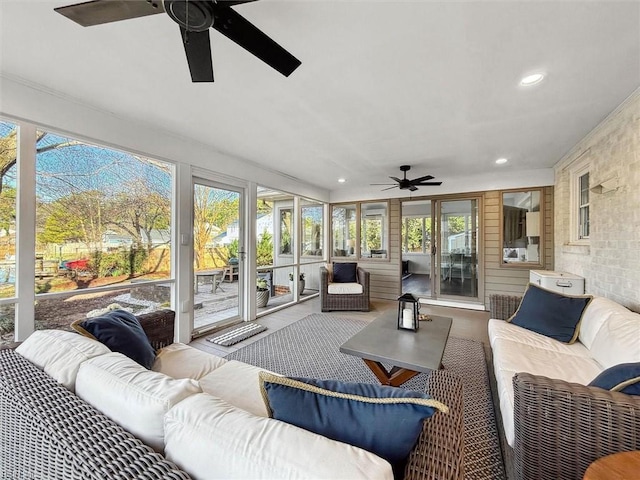 sunroom / solarium with ceiling fan