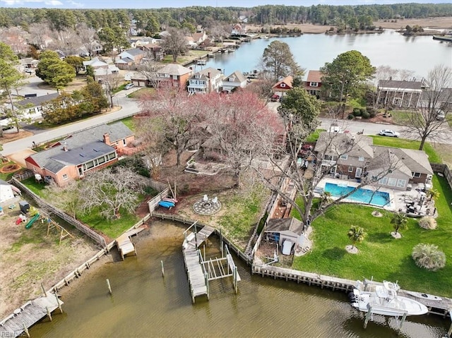 aerial view with a water view and a residential view