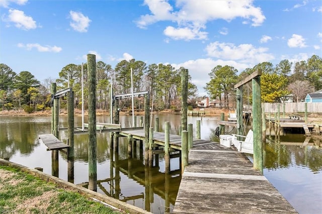 view of dock featuring a water view and boat lift