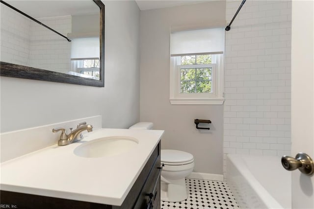 full bath featuring vanity, baseboards, tile patterned flooring, shower / bath combination, and toilet