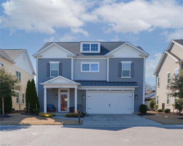 view of front facade featuring concrete driveway and an attached garage