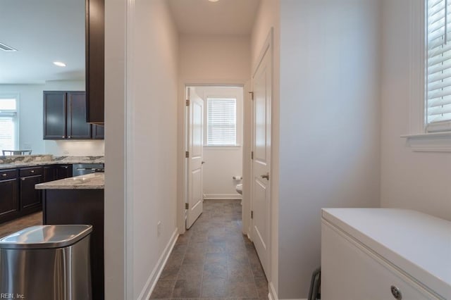 interior space featuring a wealth of natural light, recessed lighting, and baseboards