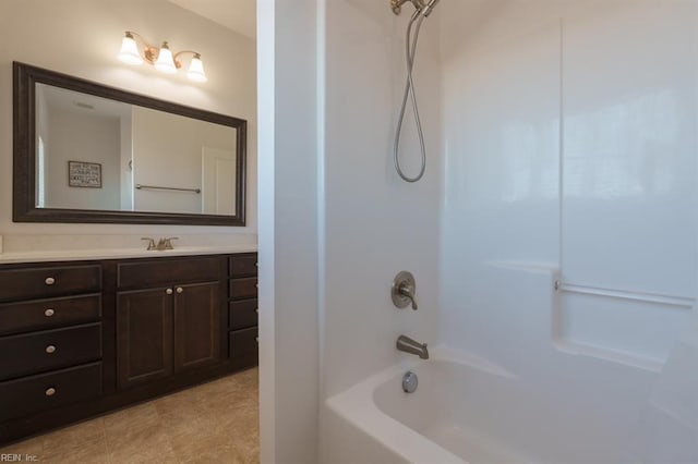 full bath featuring vanity and shower / bath combination