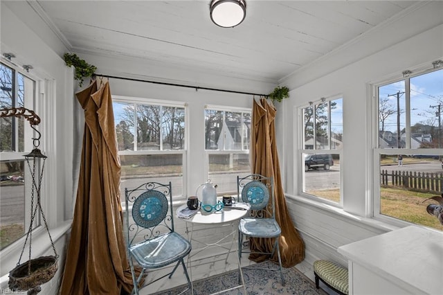 sunroom with wooden ceiling