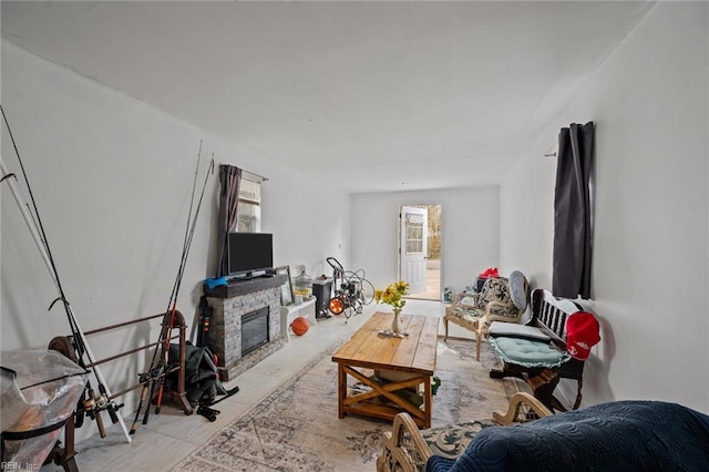 living area featuring a fireplace