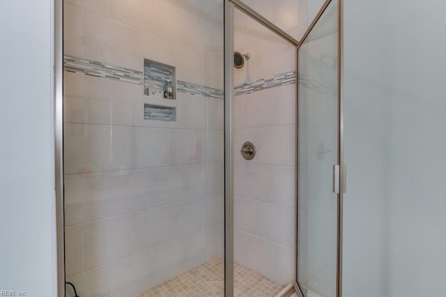 full bath featuring a stall shower