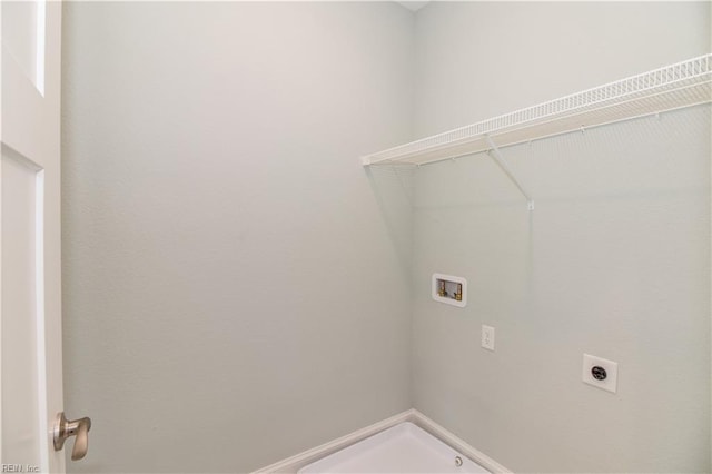 laundry room with hookup for an electric dryer, washer hookup, and laundry area