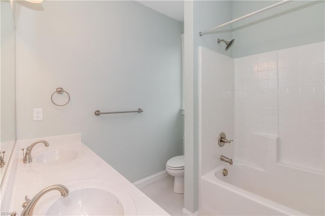 full bath with double vanity, toilet,  shower combination, and a sink