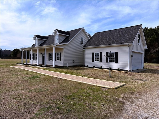 cape cod home with a garage, a porch, a front yard, and a shingled roof